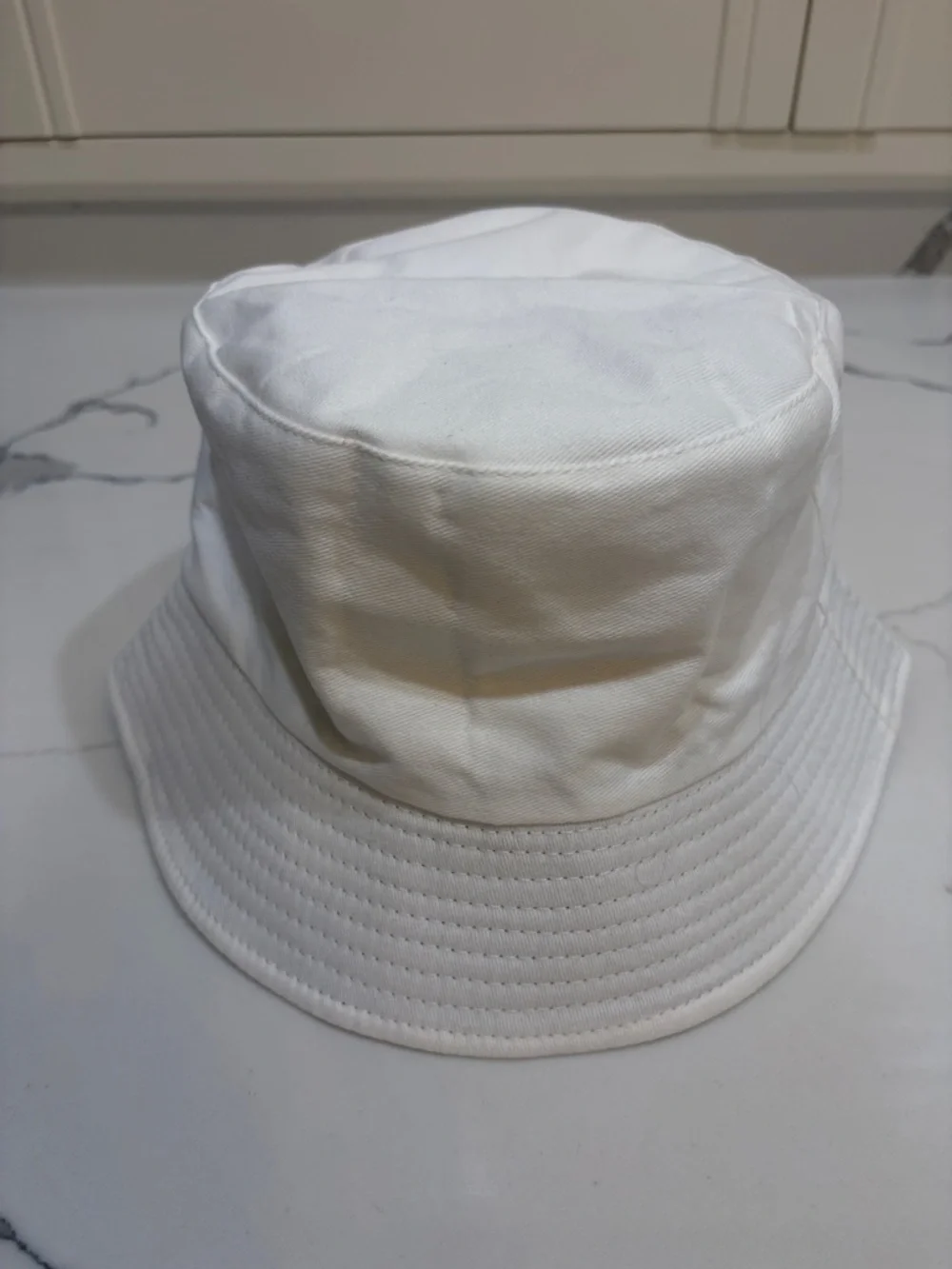 White bucket hat